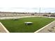 Community amenity featuring bean bag toss games and seating at 15792 W Beryl Ave, Waddell, AZ 85355