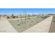 Community park featuring seating and desert landscaping along a paved path at 15792 W Beryl Ave, Waddell, AZ 85355