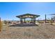 Community park featuring benches, picnic tables, playground equipment, and landscaping at 15792 W Beryl Ave, Waddell, AZ 85355
