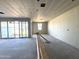 Living Room space with large windows, ready for customization and elegant finishing touches at 15792 W Beryl Ave, Waddell, AZ 85355