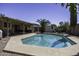 Inviting backyard pool area with lush landscaping, perfect for summer relaxation and outdoor activities at 1623 E Krystal St, Casa Grande, AZ 85122