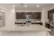 Spacious kitchen with granite countertops, stainless steel appliances, and ample cabinet space at 19834 N Tammy St, Maricopa, AZ 85138