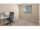 Office with tan walls, carpet flooring, a ceiling fan, a computer, and bright natural light at 19834 N Tammy St, Maricopa, AZ 85138