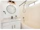 Clean bathroom features modern fixtures, stylish vanity, and a shower-tub combination at 2030 S 86Th Dr, Tolleson, AZ 85353