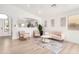 Cozy living room with modern furniture, neutral decor, and an open layout at 2030 S 86Th Dr, Tolleson, AZ 85353