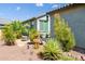 Secluded backyard patio area features lush landscaping and comfortable seating at 21150 N Evergreen Dr, Maricopa, AZ 85138