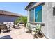 Inviting backyard patio with ample seating, perfect for relaxing and entertaining at 21150 N Evergreen Dr, Maricopa, AZ 85138