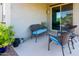 Relaxing covered patio with comfortable seating and lush greenery at 21150 N Evergreen Dr, Maricopa, AZ 85138