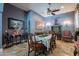 Charming dining room with travertine floors and decorative accents, great for entertaining guests at 2160 E Kenwood St, Mesa, AZ 85213