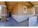 Inviting covered front porch featuring stone pillars and a view of the home's entry at 2337 E Fraktur Rd, Phoenix, AZ 85040