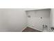 Bright laundry room has tile floor and washer/dryer hookups ready for use at 2337 E Fraktur Rd, Phoenix, AZ 85040