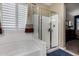 Bright bathroom featuring a bathtub and an enclosed shower at 23707 W Hess Ave, Buckeye, AZ 85326