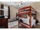 Bedroom with bunk beds and a blanket featuring a dog at 23707 W Hess Ave, Buckeye, AZ 85326