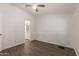 Spacious bedroom with vinyl floors leading to a bathroom with vanity at 2388 S Vista Rd, Apache Junction, AZ 85119