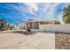 Welcoming home with covered porch, perfect for enjoying outdoor living in a serene setting at 2388 S Vista Rd, Apache Junction, AZ 85119