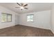 Spacious living room boasts laminate flooring and ample natural light, perfect for relaxation at 2388 S Vista Rd, Apache Junction, AZ 85119