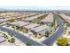 Community aerial view showcasing homes, streets, and the surrounding landscape at 25421 S 228Th St, Queen Creek, AZ 85142