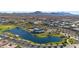 Aerial landscape featuring a lake, pools, clubhouse, and neighborhood at 25421 S 228Th St, Queen Creek, AZ 85142