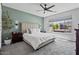 Inviting bedroom with a modern color palette, stylish lighting, and comfortable bed at 25421 S 228Th St, Queen Creek, AZ 85142