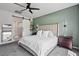 Tranquil bedroom with a modern design, sleek fixtures, and a peaceful atmosphere at 25421 S 228Th St, Queen Creek, AZ 85142