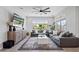 Open-concept living area boasting natural light, comfortable seating, and elegant decor at 25421 S 228Th St, Queen Creek, AZ 85142