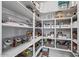 Well-organized pantry with ample shelving and storage space for food and kitchen essentials at 25421 S 228Th St, Queen Creek, AZ 85142