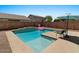 Beautiful inground pool with tanning shelf and desert landscaping at 271 W Roadrunner Dr, Chandler, AZ 85286