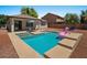 Backyard pool features a built-in hot tub and plenty of space for entertaining friends and Gathering at 271 W Roadrunner Dr, Chandler, AZ 85286