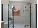 Beautiful shower with sleek glass enclosure, rain shower head, and built-in bench at 271 W Roadrunner Dr, Chandler, AZ 85286