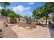 Outdoor kitchen features built-in grill, counter space, and patio area for outdoor entertaining at 3152 E San Pedro Ct, Gilbert, AZ 85234