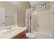Clean bathroom featuring a sink with silver hardware, toilet, shower, and bathtub at 3152 E San Pedro Ct, Gilbert, AZ 85234