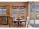 Eat-in kitchen with adjacent patio access at 3152 E San Pedro Ct, Gilbert, AZ 85234