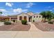 Charming single-Gathering home featuring desert landscaping, a tile roof and a well maintained lawn at 3152 E San Pedro Ct, Gilbert, AZ 85234