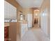 Bathroom featuring a tub, carpet, neutral paint, and access to closets at 3152 E San Pedro Ct, Gilbert, AZ 85234
