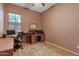 Well-lit home office with built-in desk at 3152 E San Pedro Ct, Gilbert, AZ 85234