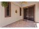 Covered patio with decorative accents and access to the interior through a sliding glass door at 3152 E San Pedro Ct, Gilbert, AZ 85234