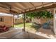 Relaxing backyard patio with a ceiling fan overlooking the spacious yard at 3238 W Altadena Ave, Phoenix, AZ 85029
