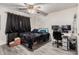 Cozy bedroom offers a comfortable retreat with a functional desk area at 3238 W Altadena Ave, Phoenix, AZ 85029