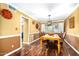 Traditional dining room with wooden table and chairs, complemented by two-tone wall decor at 3377 W Grandview Rd, Phoenix, AZ 85053