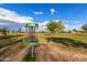 Outdoor disc golf course with expansive green space, blue skies, and mature trees in a relaxing park setting at 3377 W Grandview Rd, Phoenix, AZ 85053