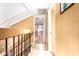 Hallway with tile floor and natural light features neutral wall color and open access at 3377 W Grandview Rd, Phoenix, AZ 85053