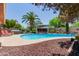 Outdoor oasis featuring a sparkling pool, spa, pergola, and lush landscaping for ultimate relaxation at 3377 W Grandview Rd, Phoenix, AZ 85053