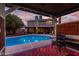 Relaxing backyard pool with a patio, seating area and view of the house, perfect for enjoying the outdoors at 3377 W Grandview Rd, Phoenix, AZ 85053