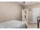 Bright bedroom with a crib and wood flooring at 34834 N Surrey Ln, San Tan Valley, AZ 85140