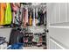 Walk-in closet providing ample storage space for clothing and shoes at 34834 N Surrey Ln, San Tan Valley, AZ 85140
