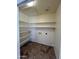 Pantry with shelving, tiled floor, and neutral paint at 3779 E Sweetwater Ave, Phoenix, AZ 85032