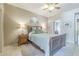 Cozy bedroom featuring a comfortable bed and bedside tables at 3830 E Lakewood Pkwy # 1051, Phoenix, AZ 85048