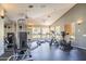 Community fitness center with modern equipment and natural light at 3830 E Lakewood Pkwy # 1051, Phoenix, AZ 85048
