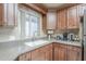 Spacious kitchen with updated fixtures, including a stylish faucet and plentiful counter space at 3830 E Lakewood Pkwy # 1051, Phoenix, AZ 85048