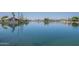 Breathtaking view of lakefront homes reflecting peacefully on the water in a warm climate at 3830 E Lakewood Pkwy # 1051, Phoenix, AZ 85048